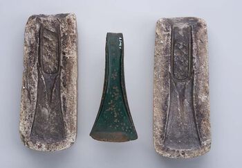Bronze axe from Morstad in Gran, Innlandet. 1700-1500 BCE. Casting mold in soapstone. Prestevatn, Farsund, Agder. 1500-1300 BCE. C21853. View large format.