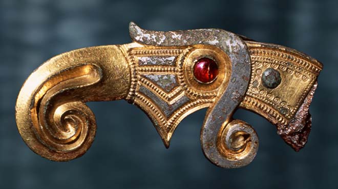 Close up of a gold plated object from the Viking Age,